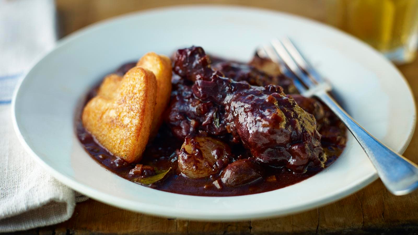 Coq au vin - classic chicken cooked in wine dish