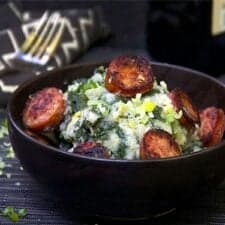 Stamppot - kale and mashed potatoes topped with smoky sausage